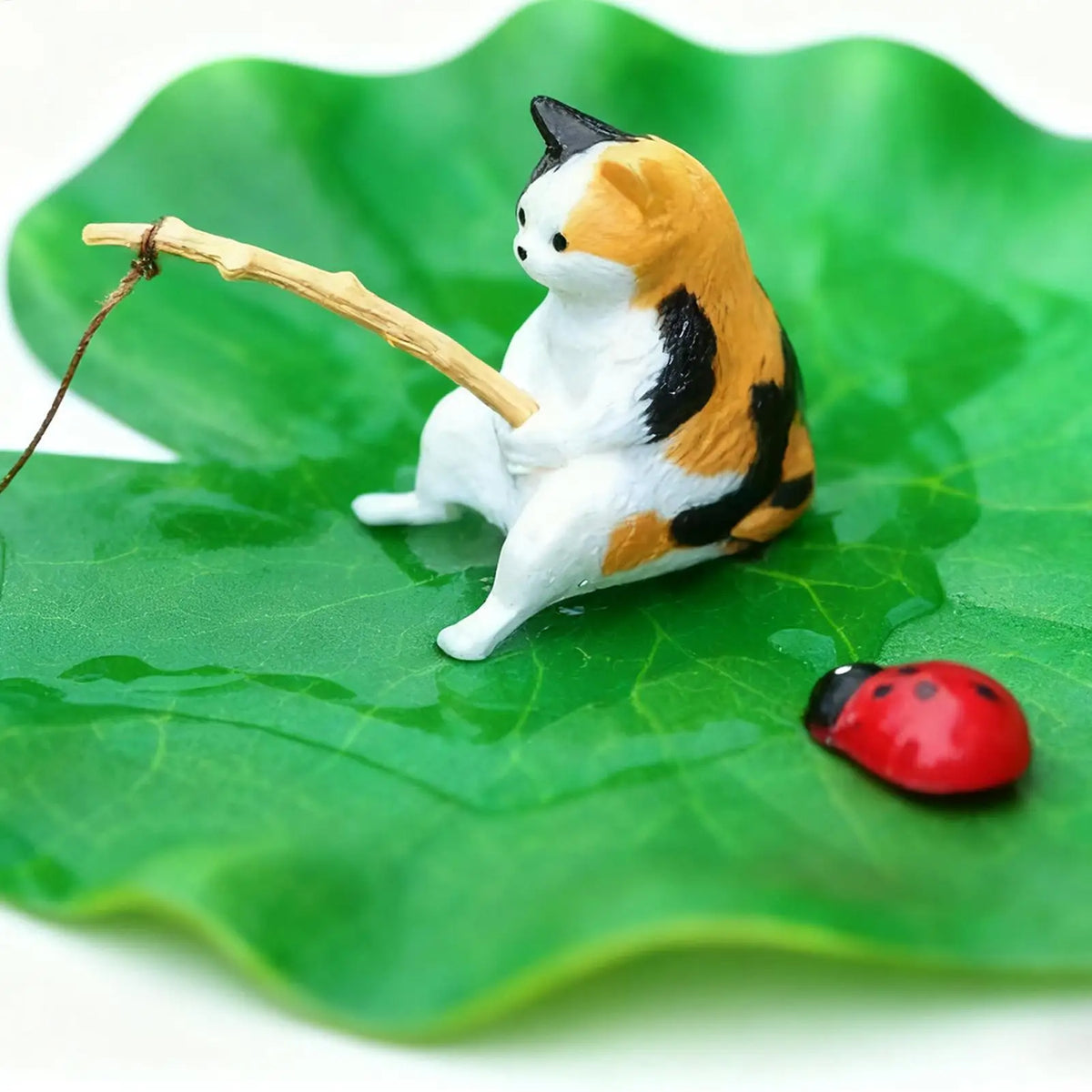 Cat Fishing on Floating Lily Pad Cat Fishing - ProPawPet.com